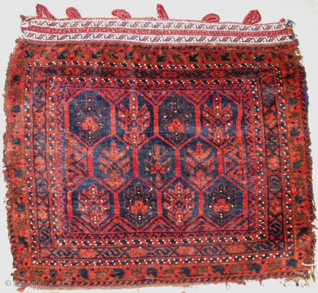 Timuri type Baluch Bagface, exceptionally lustrous wool, great soft shine, complete fasteners preserved on top along with floating weft ends. Very sweet piece. 21"x24"         