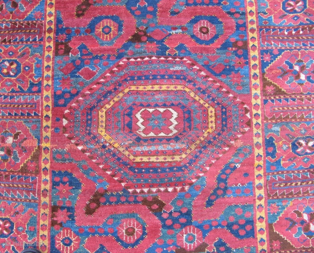Cloudband Bashir Carpet, fantastic color with several blues and green. Condition is good with a little scattered repair and repair the sides. The length is 11 feet long.     