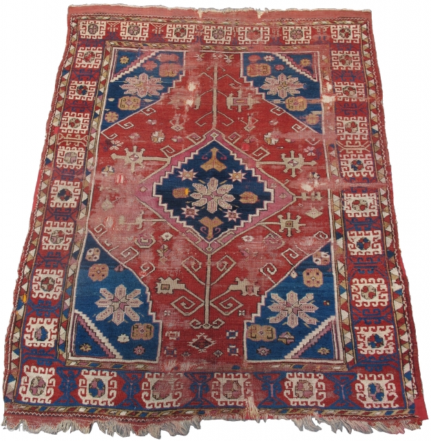 Bergama area Anatolian Turkish rug, an early rendition of this uncommon type with saturated color and open drawing, silk knots in the center. Stars and ewers. 64"x78" 163x198cm. Inscribed in two places  ...