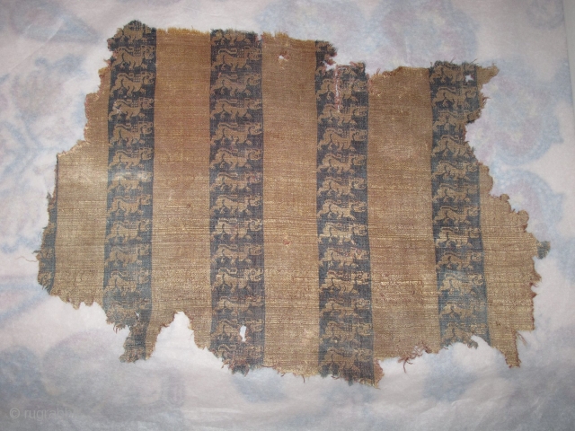 Chinese Textile Fragment with Bands of Striding Lions, warp-faced brocade, 3rd-5th century, Jin Dynasty 晉朝 or Northern Wei Dynasty 北魏 .            