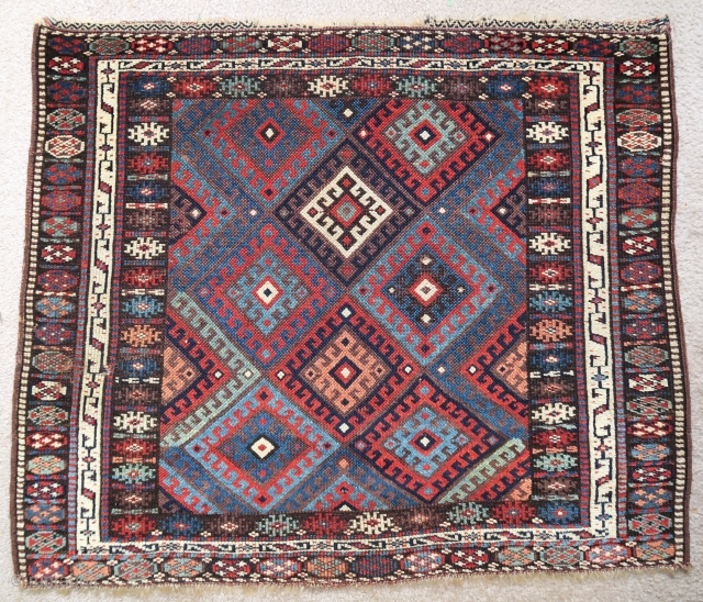 Large square Jaf Kurd bag, slightly unusual layout with a particularly good white S narrow border. 3'5"x2'10"                
