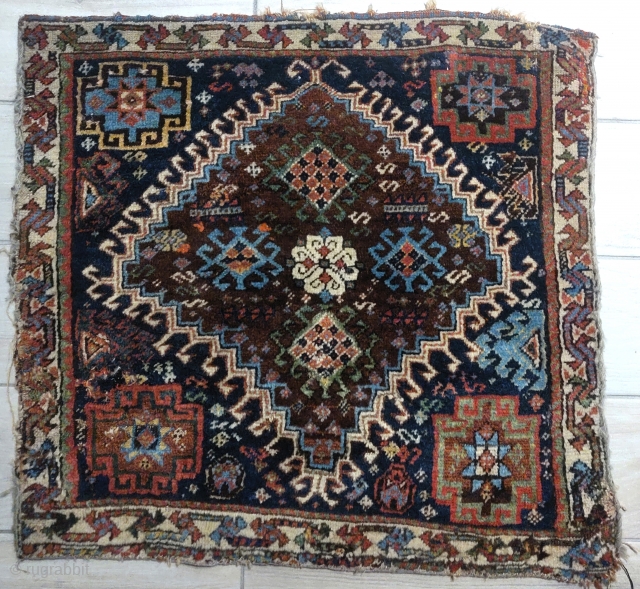 Quarky Southwest Persian Qashqai bagfaces, soft wool, diverse color. Rounded top of central diamond, concaved bottom.                 