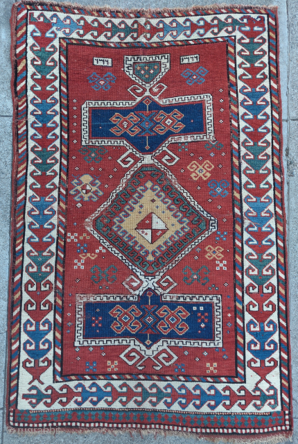 Small Caucasian Kazak rug with a very abstracted classical medallion                       