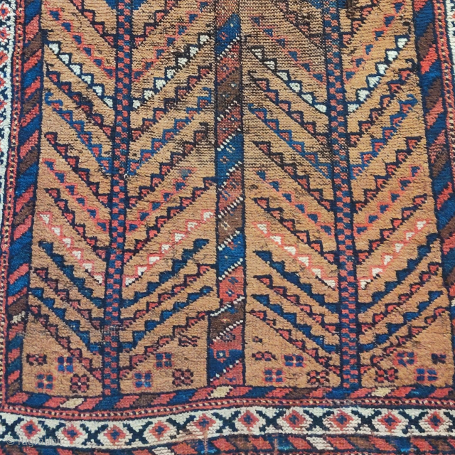 Camel-ground tribal rug with a pair of abstracted trees. 19th century, all good colors. Black, tan, grey, and red weft. Asymmetric knot open right. Some type of rustic south Persian tribal, perhaps  ...