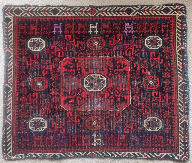 Baluch octagon star bag face with animal trains and copious silk highlights. 28"x24"
This piece has a great presence and displays well. Some coroded brown wool looks like it had been painted to  ...