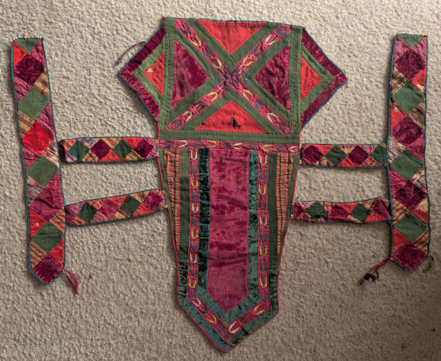 Tekke Turkmen camel head-dress. Great condition made wit several types of textiles including, two colors of velvet, silk embroidery, red wool, block printed cotton, etc.        