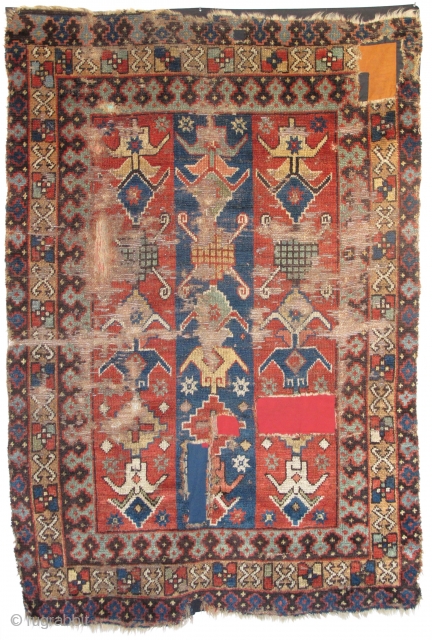 Old and unusual Eastern Anatolian Rug: dynamism, wear, patches and all                      