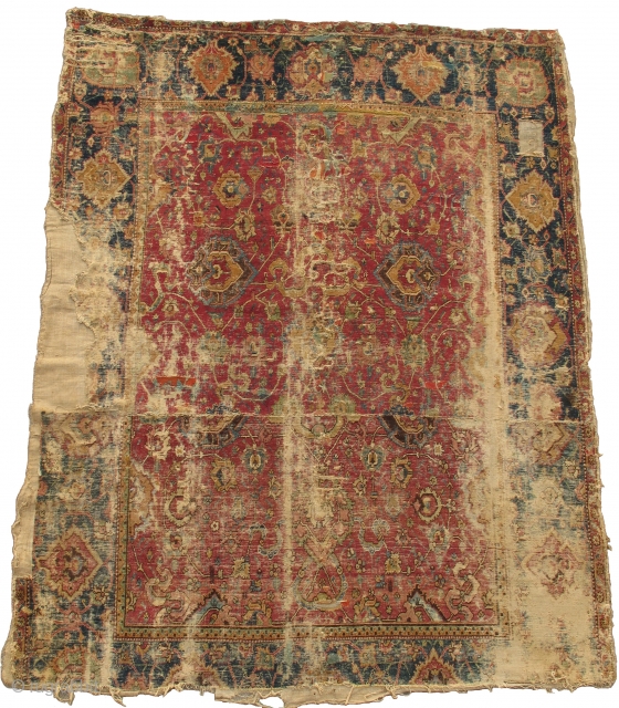 Isfahan Carpet, Safavid era, first half 17th century, silk and cotton warp, cotton weft, lac red ground, fine weave, cut and shut, scattered old repair and damage, still majestic. size= 4'8"x6'
 Note  ...