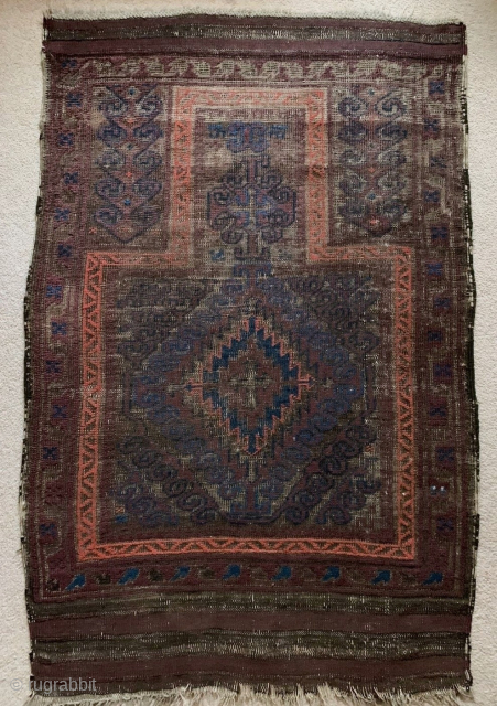 Good rug bad picture, Baluch Mushwani type prayer rug, all natural colors, (can't quite get them right in photos) lots of aubergine, blue, and slates, with corrosive brown giving a compelling sculptural  ...