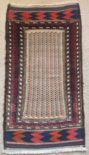 Very graphic Baluch mixed technique sofreh. Knotted pile borders, a fine geometric repeat flat-woven weft float brocade field with kilim ends. Saturated all natural dyes. A rare and compelling artistic piece in  ...