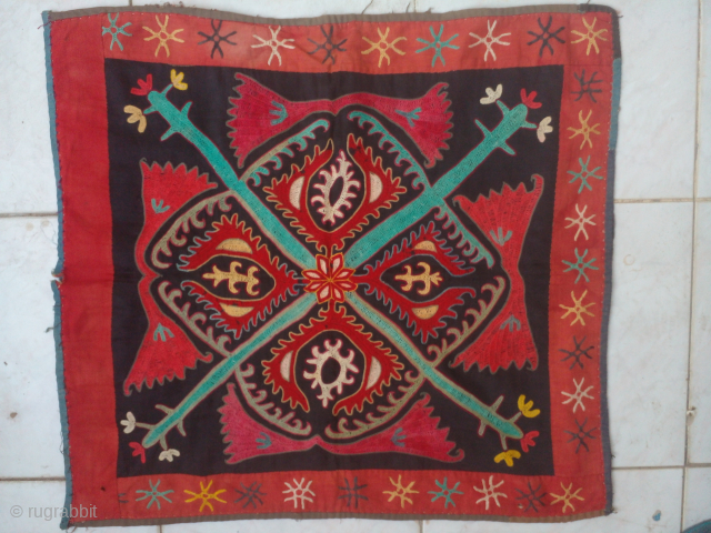 Kyrgyz silk embroidery on a red clothe around 1900                        