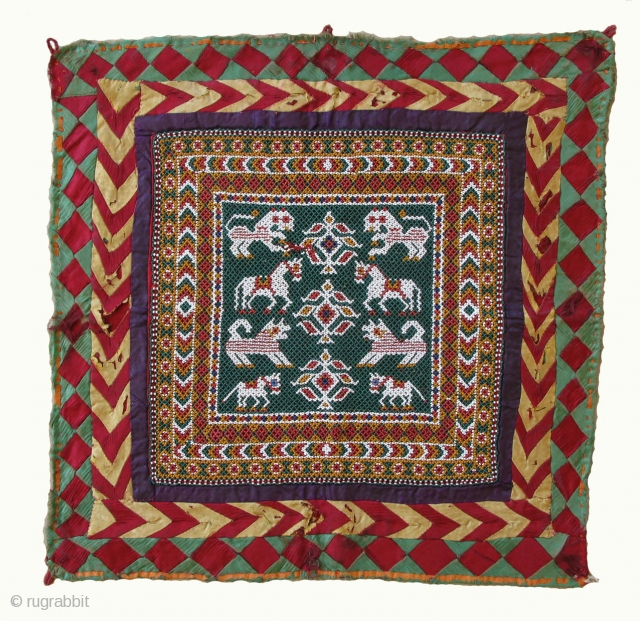 Beadwork Wallhanging
44x44cm; beaded part 27x27cm
Kathiawar, Gujarat, India)
19/20th century
Perfect condition
 The method of work is a tri-bead system (tran moti-no thansiya), worked row-by-row, three beads being taken up at each stitch; on the  ...