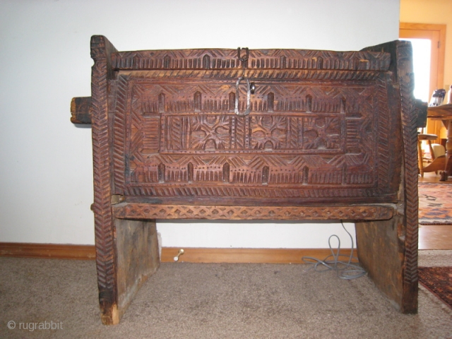 Swat Kohistan, Pakistan:  Walnut hand-carved storage box.  Deeply incised front.  No nails in the construction.  Held  together with wooden pegs.  25 inches high, 27 inches wide,  ...