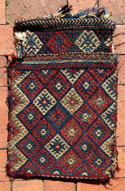 Complete Kurdish salt bag, with unusually wide, short neck. Latter part of 19th Century.  Size is 20 inches high, 14 inches (wide (51 cm x 36 cm). Front mostly in weft-float  ...