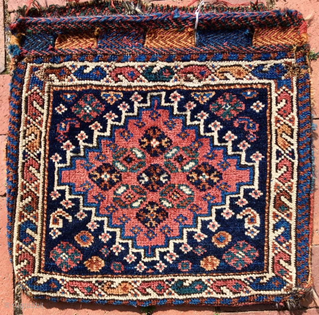 Pretty southwest Persian small Bag, most likely Luri. 16” x 17” (41 cm x 43 cm).,  Pile face.  Flatweave back with a complex brocade design. closure panels with brocade designs.  ...