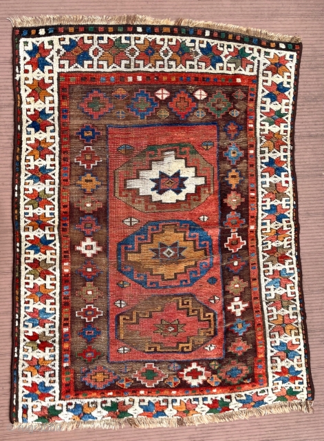 Anatolian, probably central.  60” x 44” (153 cm x 110 cm)    Good pile of soft silky wool in the border areas, shorter pile to no pile toward the  ...