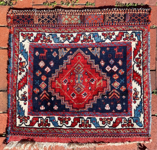 A Persian Afshar khorjin face. Most likely early 20 C.---it has cotton warps.   Size is  27” x 26” (69 cm x 66 cm).   Very good condition. Vibrant  ...