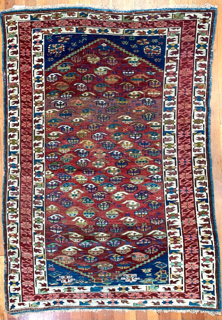 Antique Caucasian Kuba rug.  63 in. x 42 in. (160 cm x 107 cm).  The central border design and its dark red and coral colors are typical of Zeichur, as  ...