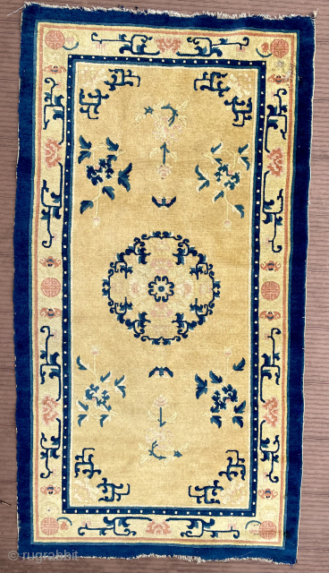 Small Chinese rug—57 in x 31 in (145 cm x 78 cm). Probably early 20th C.  Attractive rug with nice soft colors and great condition. Relatively thin rug, originally with short  ...