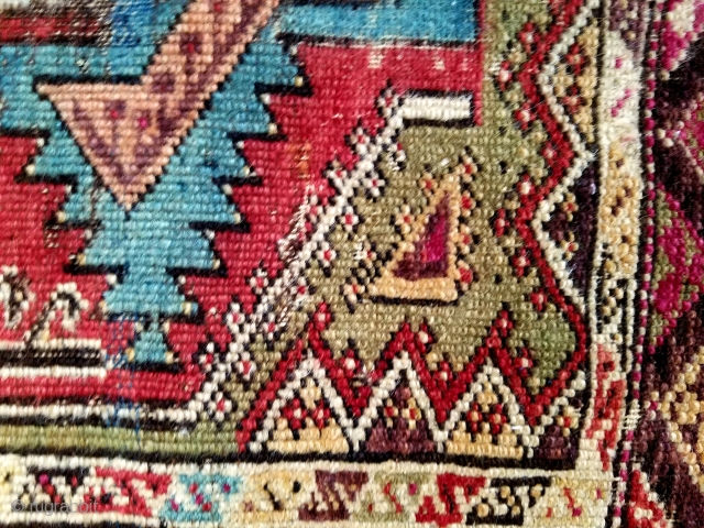 Anatolian yastik - about 24" x 29".  Wonderful color and squarish size.  'As found' condition with few scattered old crude repairs. Nice example.        