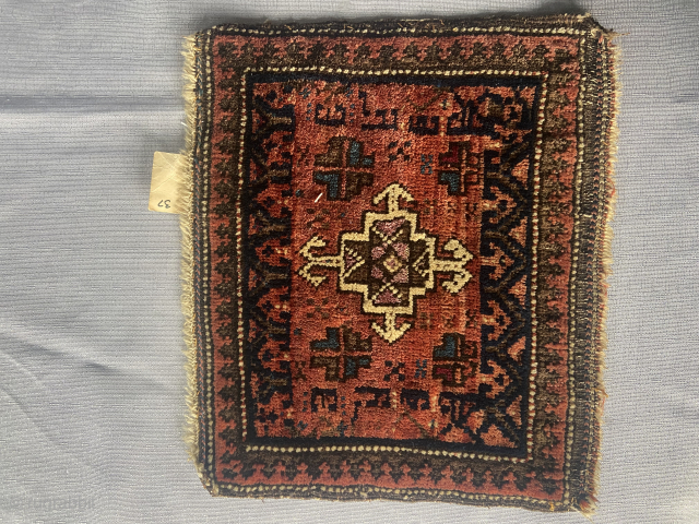 Baluch chanteh about 12” x 13” with silk highlights in wonderful condition.  Email: rmartin4155@gmail.com                  