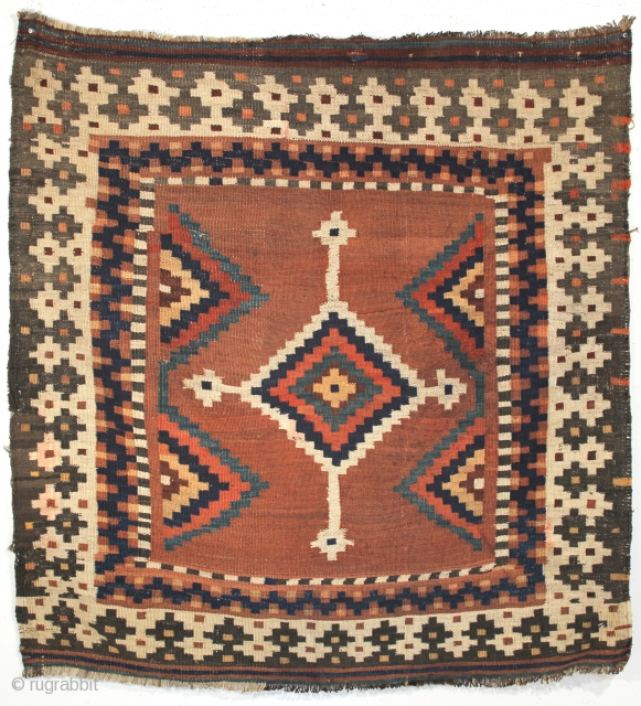 Afshar sofreh with a cross-motif surrounded by an unusual inner border and four step-triangle medallions.  Kirman area, circa the late 19th century. 3-6 x 3-9 ft.      