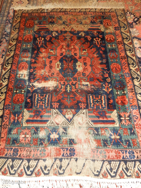 An exceptionally interesting seychour kuba with damage 
about 5 x 6 size ....Go to our new website -  Boylston Associates Antique Caucasian Rugs- for a good look and the price

  