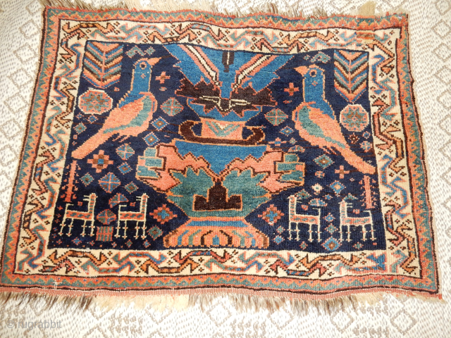 TREES, BIRDS, GOATS, SHEEP, AND A FLOWERPOT
BOYLSTON ASSOCIATES ANTIQUE CAUCASIAN RUGS 
                     