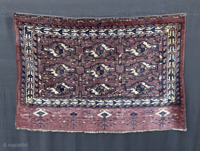 Yomut Turkmen Chuval-face, second half 19th century in very good overall condition albeit with two very small areas of discolouration - 1.07 x 0.73m (3’ 6” x 2’ 5”).    