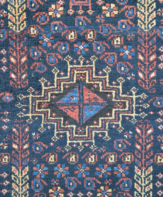 Lovely small Baluch rug of the Ferdows region, south-east Persia circa 1900.
1.30 x 0.80m (4' 3" x 2' 7").              