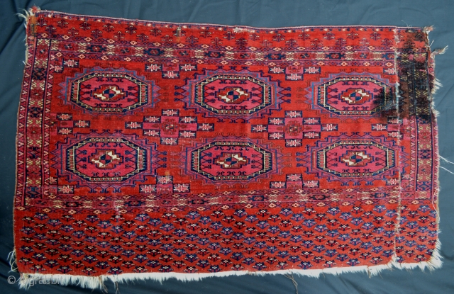 Beautiful 19th Century Tekke Chuval - sadly damaged in the top right-hand corner as well as cut and re-joined. Wonderful colours.            