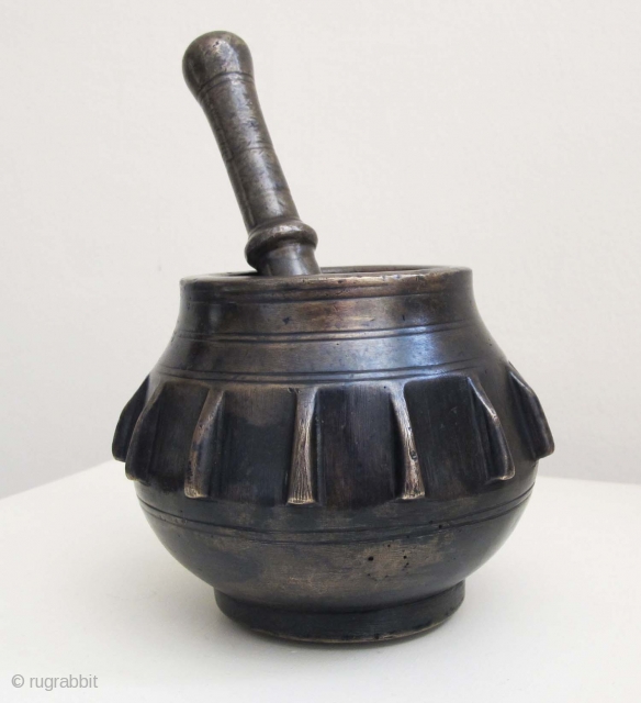 OTTOMAN Brass Mortar & Pestle. Late 18th C. Height of mortar 9.5 cms. Weight 2 kgs.                 