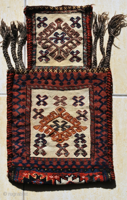 Varamin namakdan (salt-bag), early 20th c. 33 x 56 cm. All wool with ivory cotton ground. Excellent condition.               