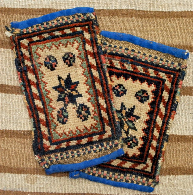 A pair of Quchan Kordi pan-holders, approx. 17 x 27 cm each, good condition, all good colours. Blue fabric added to ends. Goat smelling, would bear a good cleaning.    