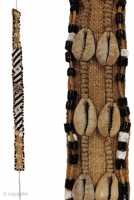 AFRICA!
Kuba people beaded headband - Congo. Mid 20th century or earlier. Cm 73x3 ca. Raffia, cowry shells, beads. Such headbands were worn by nobles of Kuba royal families. They were the sign  ...