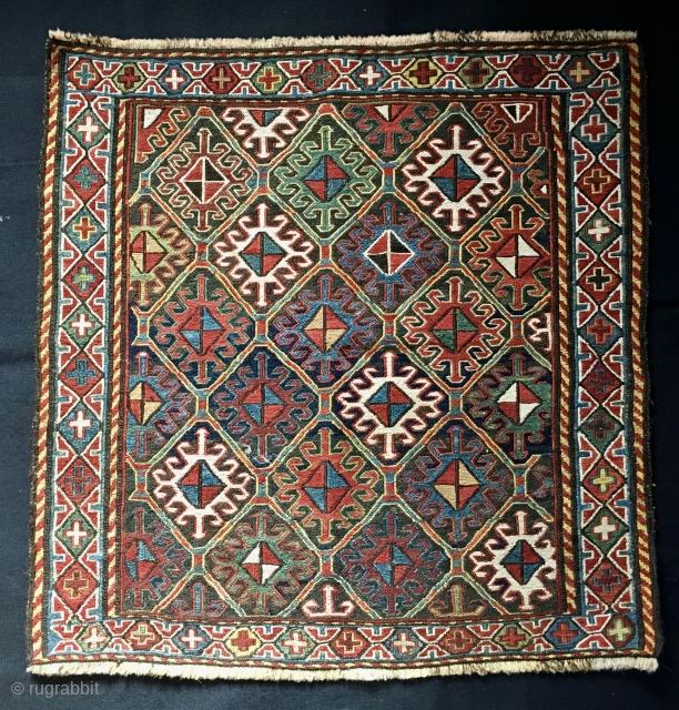 SHAHSAVAN SUMACK KHORJIN BAG FACE
Shahsavan sumack outstanding, beautiful bag face. Cm 60x60. End 19th century. All great, good colors. Super sumack weave. Lovely classical pattern. Crosses in the border, colorfull hooked hexagons  ...