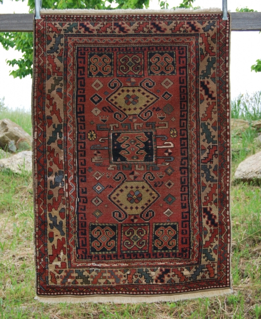 Kozak rug from Bergama area, Western Anatolia. Size is cm 97x137. Early 20th century, so, about 100 years old if not more. Low pile, one old, clearly visible restoration. Interesting pattern, great  ...