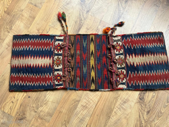 Small is beautiful!
Shahsavan kilim/sumack very colorful saddlebag/khorjin.
Size is cm 35x90 ca.
Datable 100/120 years old.
Extremely powerful and gracefully woven.
Colors are extremely bold and seem to be natural.
In great condition.
A small tribal jewel, probably  ...