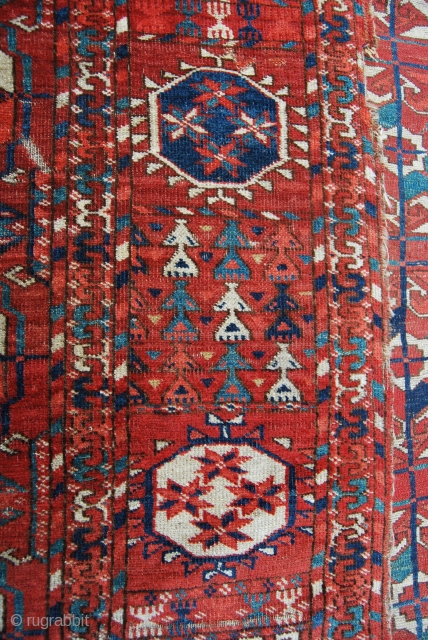 Turkmen Tekke main rug. Cm 200x222 ca. Mid 19th c. Very very thin. With a fantastic border. All wool. Several condition issues and unluckily far too fine to be restored, but at  ...