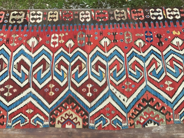 Powerful Western Anatolia Aydinli kilim strip. Cm 100x265 ca. End 19th century. Great ram horn pattern, glorious natural saturated colors. Condition: some minor oxidation, two tiny stains. Email carlokocman@gmail.com
    