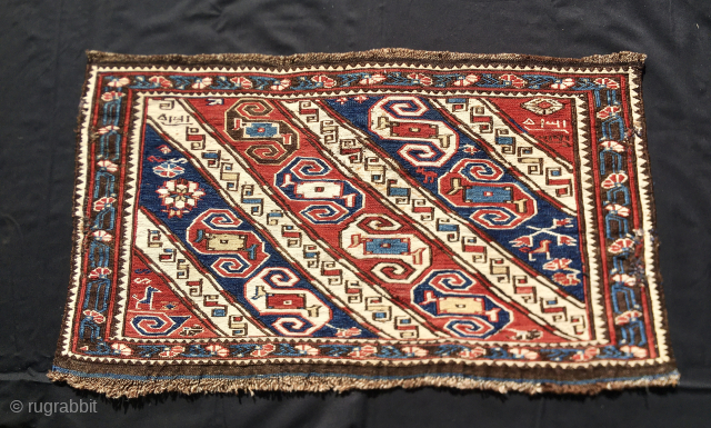 Azerbaijan, Khyzy or Xizi, north of Baku,sweet sumack bag or mafrash panel.
Size is cm 37x67. Late 19th century.
A little jewel. A rarity. 
Great Sumack weaving. 
Wonderful pattern. 
Awesome colors. White, red and  ...