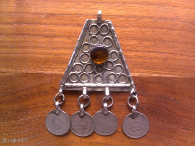 Metal Amulet, with original coins, light enough to be worn around the neck, a striking old piece.
postage extra , payment through Paypal only.          