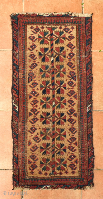 Baluch balisht, 42 x 92 cm, good dyes, multiple blues and blue-green. String of botehs complement the tree design on the sides. Good condition, corroded brown and reduced ends as shown.  