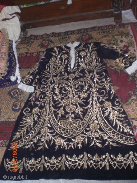 This item is a production of handwork and embroidery .ıt is embroidered  metal string on purple velvet. Metal string handworks are puffed out. this dress is very old.This dress was made  ...