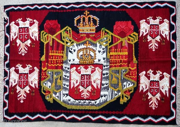 Kilim with the Coat of Arms of Serbia in excellent condition because it has always been suspended.

Origin : Serbia
Period : probably between 1950 and 1970
Size : 206 x 147 cm
Material : wool  ...