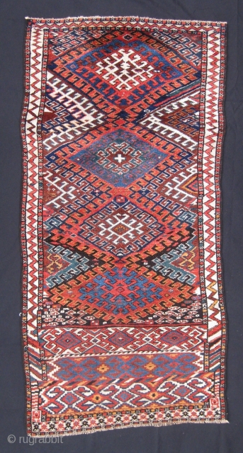 Funky Quchan Kurd with good colours, northeast Iran, ca. 1900. Minor repairs to sides and ends, overall good condition.
1.80m x 0.88m 

SOLD           