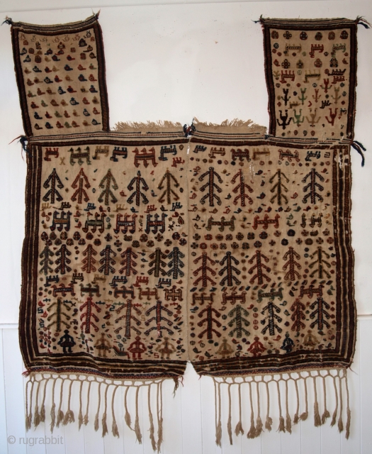 Antique South West Persian Qashqai tribal horse cover . 
http://www.knightsantiques.co.uk/439018/antique-persian-qashqai-tribal-horse-cover-blanket-or-rug-beautifully-decorated-circa-1890/
Size: 5ft 0inx 4ft 9in (153 x 145cm) excluding tassels.
              