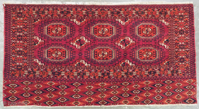 Antique Tekke Turkmen chuval face with six 'Salor' turreted guls. www.knightsantiques.co.uk

Circa 1890.
Size: 5ft 3in x 2ft 10in (159 x 87cm).
Chuval are storage bags used by the Turkmen nomads for the storage of  ...