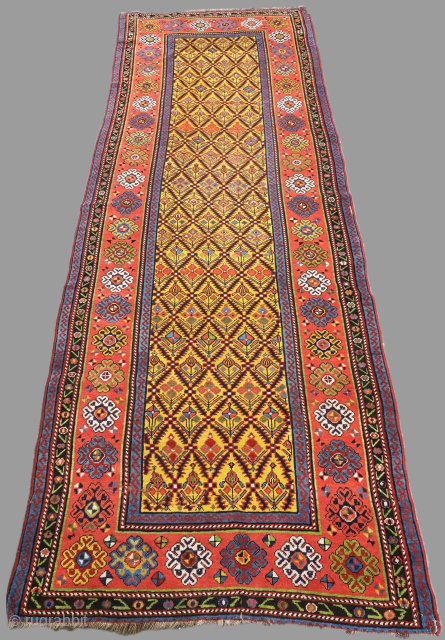 Antique Caucasian Gendje Kazak runner with floral lattice design. www.knightsantiques.co.uk
Size: 10ft 2in x 3ft 10in (310 x 116cm).
Circa 1890.

A good example Gendje Kazak runner with with a floral lattice design on a  ...