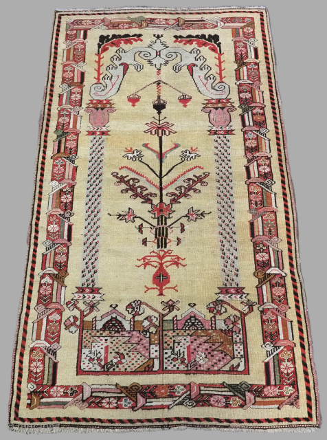 Antique Anatolian Kirsehir village prayer rug of scarce 'Sultan' design.
www.knightsantiques.co.uk 
Size: 6ft 4in x 3ft 8in (192 x 112cm).

2nd half 19th century.

An interesting pictorial prayer rug on a soft yellow / camel  ...